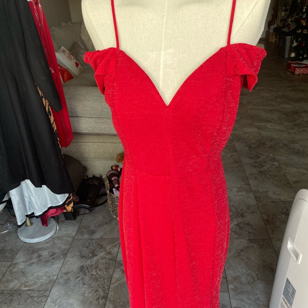 Beautiful off the shoulder red dress in a shimmery fabric with adjustable straps